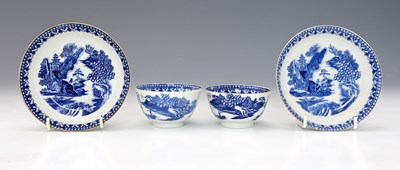 Lot 846 - A pair of hybrid hard paste porcelain blue and...