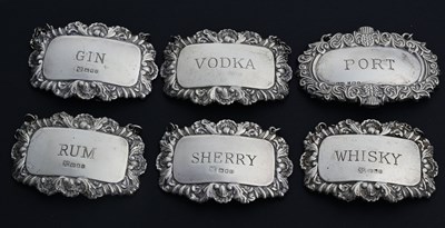 Lot 84 - Six Elizabeth II silver wine labels, to...