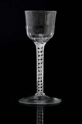 Lot 392 - An opaque twist wine glass, circa 1760, the...