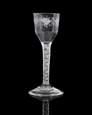 Lot 403 - An opaque twist engraved wine glass, circa...