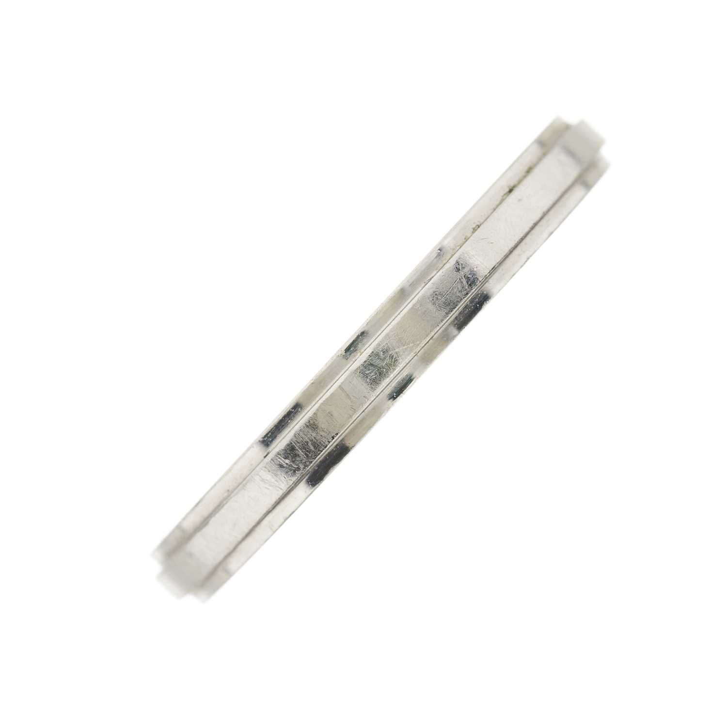 Lot 50 - Cartier, a platinum d'Amour wedding band ring