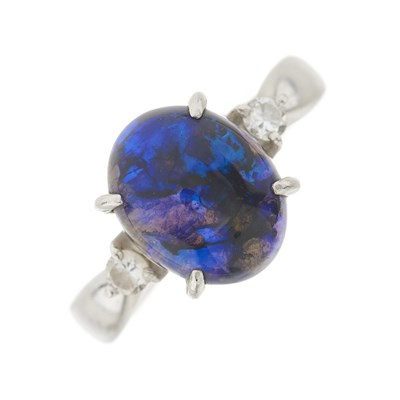 Lot 108 - A platinum black opal and diamond three-stone ring