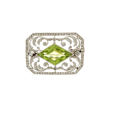Lot 12 - An early 20th century kite-shape peridot and...