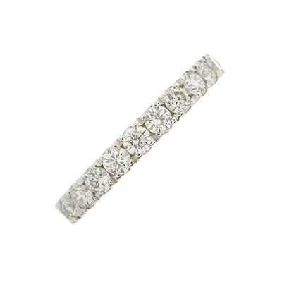 Lot 26 - An 18ct gold brilliant-cut diamond half...