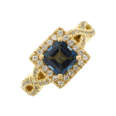 Lot 37 - An 18ct gold blue topaz and brilliant-cut...