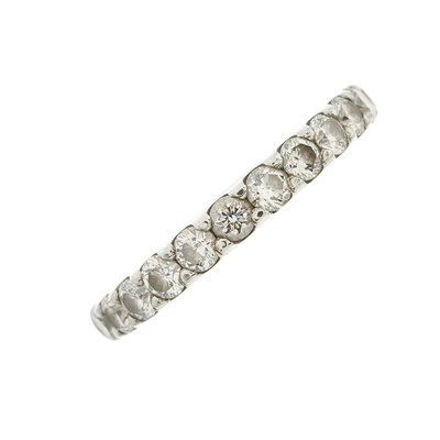 Lot 51 - A platinum brilliant-cut diamond half eternity...