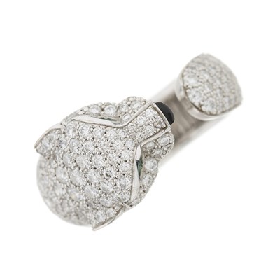Lot 63 - Cartier, an 18ct white gold diamond, emerald and onyx Panthere de Cartier ring