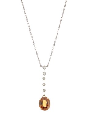 Lot 80 - A mid 20th century orange topaz drop pendant,...