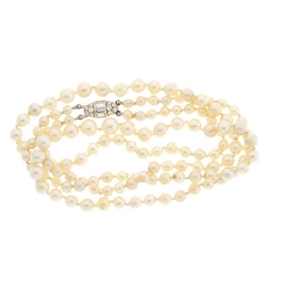 Lot 83 - A mid 20th century graduated pearl two-row...