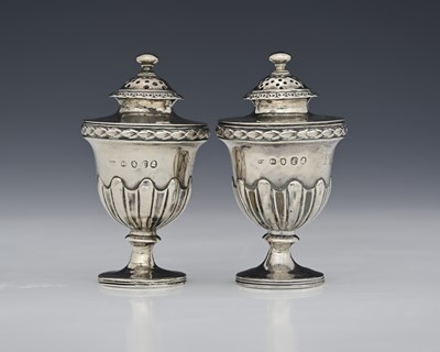 Lot 166 - A pair of George IV Regency silver pepper pots,...