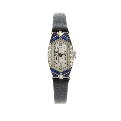 Lot 97 - Gubelin, an Art Deco platinum, calibre-cut...