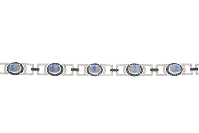 Lot 118 - An 18ct gold moonstone cabochon, sapphire and...