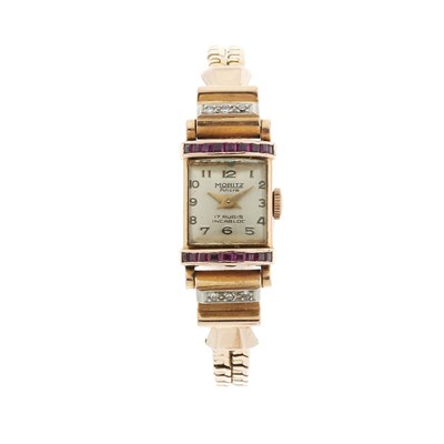 Lot 170 - A mid 20th century 14ct gold calibre-cut ruby...