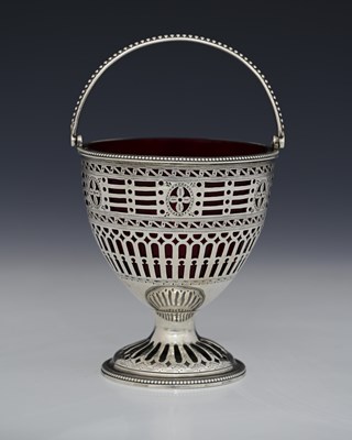 Lot 282 - A George III silver neoclassical sugar basket,...