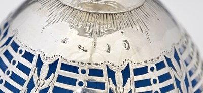 Lot 91 - A George III silver neoclassical sugar basket,...