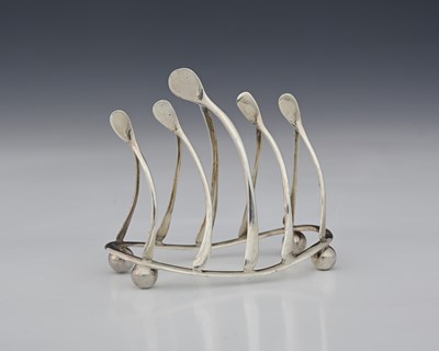 Lot 36B - An Edwardian silver novelty wishbone toast...