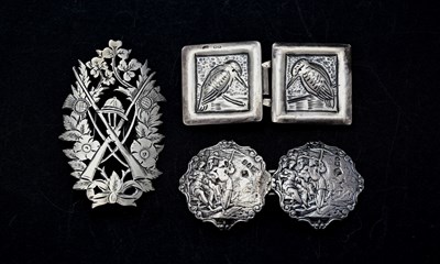 Lot 298 - Three twentieth-century silver buckles, to...