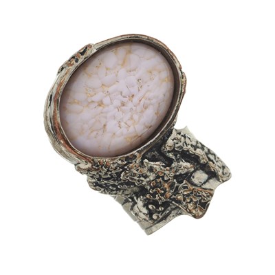 Lot 487 - Yves Saint Laurent, a pink and gold paste abstract ring.