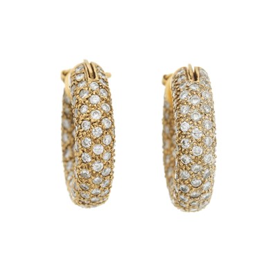Lot 180 - A pair of brilliant-cut diamond hoop earrings