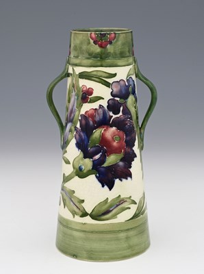 Lot 258 - William Moorcroft, a Persian twin handled vase,...