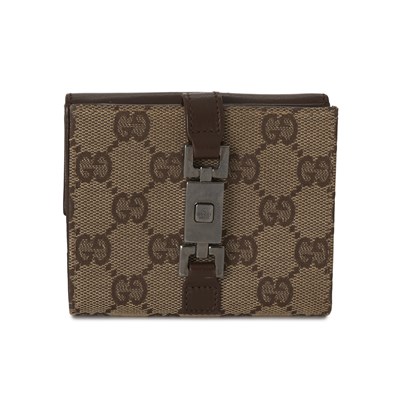 Lot 404 - Gucci, a Jackie compact wallet.