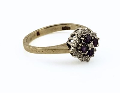 Lot 362 - A 9ct gold amethyst and single-cut diamond cluster ring