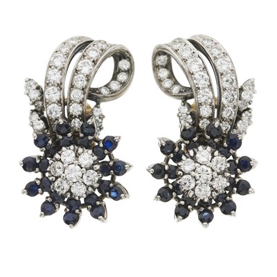 Lot 95 - A pair of brilliant-cut diamond and sapphire floral earrings