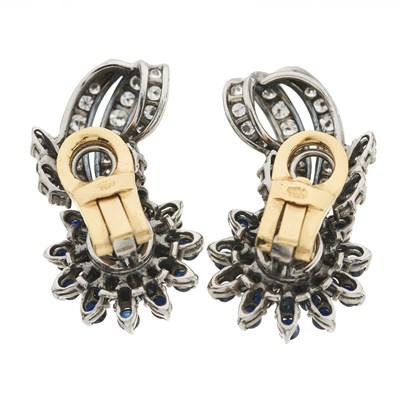 Lot 95 - A pair of brilliant-cut diamond and sapphire floral earrings