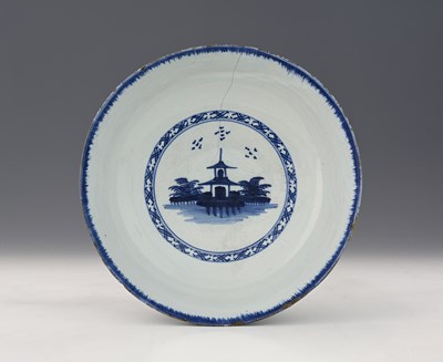 Lot 768 - An English Delft blue and white bowl, circa...