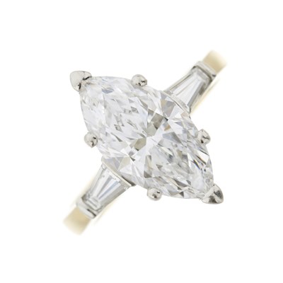 Lot 105 - An 18ct gold marquise-cut diamond single-stone ring, with diamond shoulders