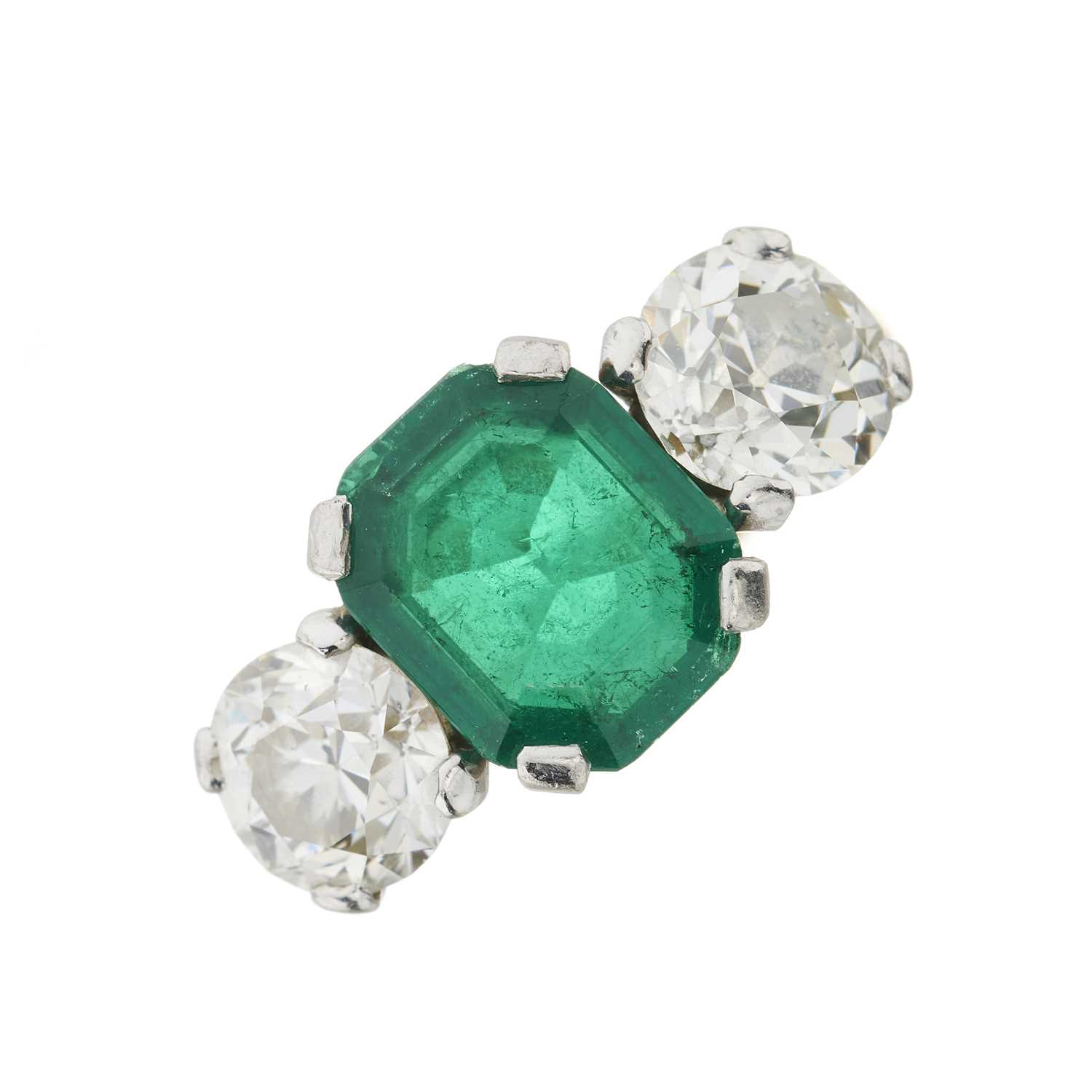Lot 64 - An emerald and brilliant-cut diamond three-stone ring, with report