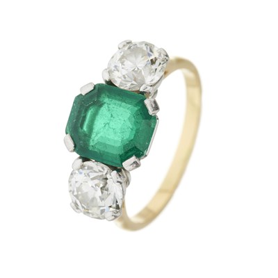 Lot 64 - An emerald and brilliant-cut diamond three-stone ring, with report
