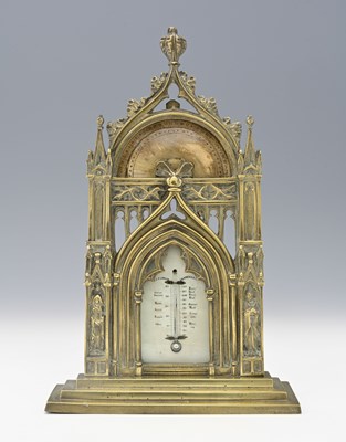 Lot 340 - A Gothic revival cast brass desk thermometer...