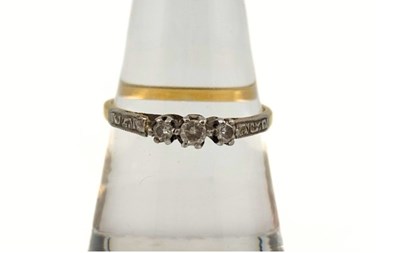 Lot 359 - A brilliant-cut diamond three-stone ring