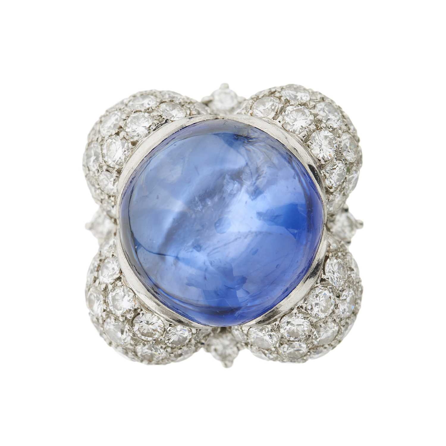Lot 50 - A sapphire cabochon and brilliant-cut diamond dress ring
