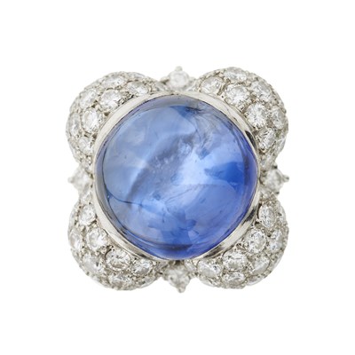 Lot 50 - A sapphire cabochon and brilliant-cut diamond dress ring