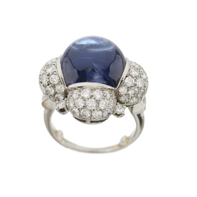 Lot 50 - A sapphire cabochon and brilliant-cut diamond dress ring