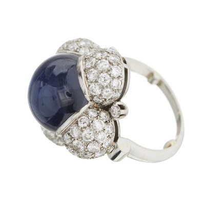Lot 50 - A sapphire cabochon and brilliant-cut diamond dress ring