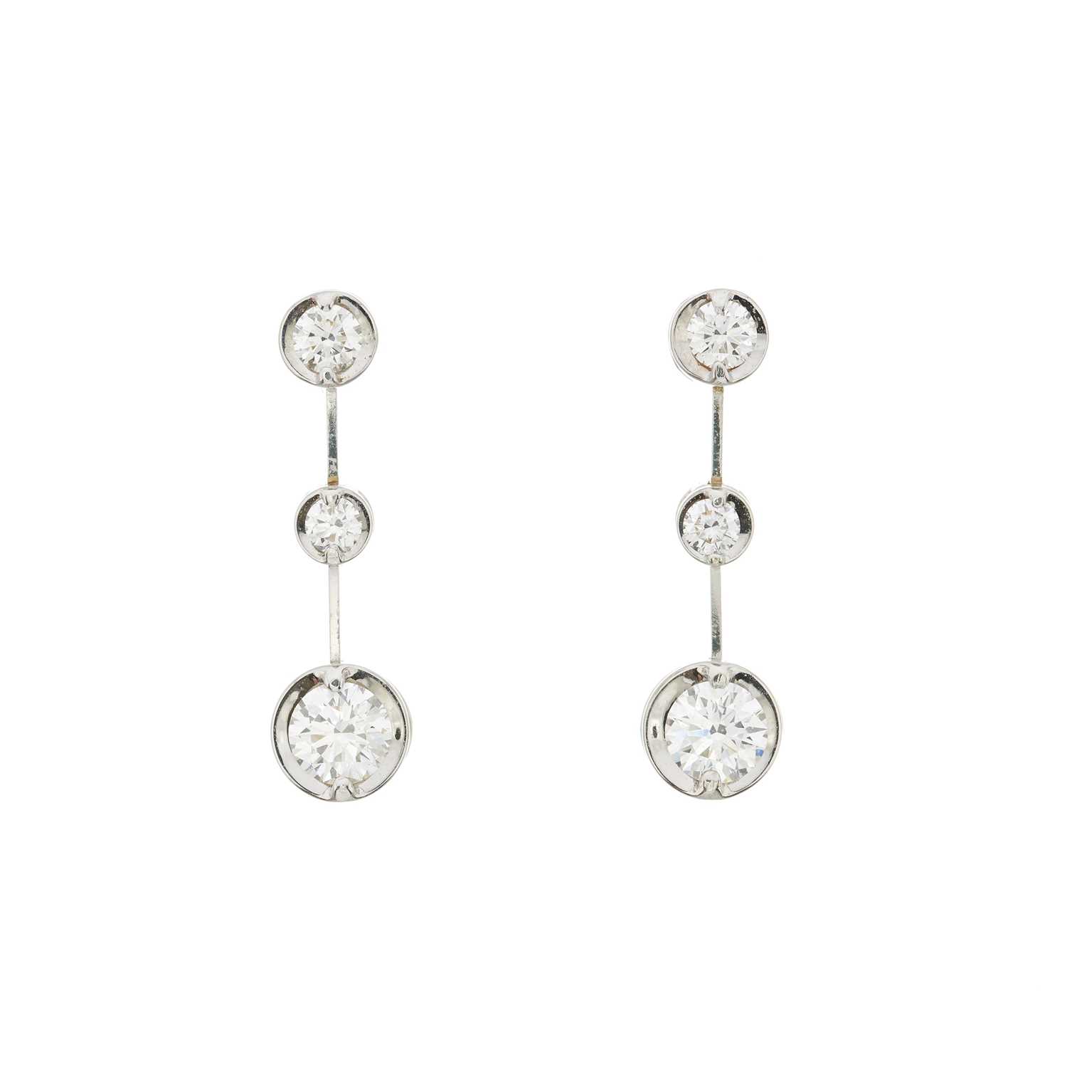 Lot 63 - A pair of 18ct gold brilliant-cut diamond drop earrings