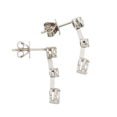 Lot 63 - A pair of 18ct gold brilliant-cut diamond drop earrings