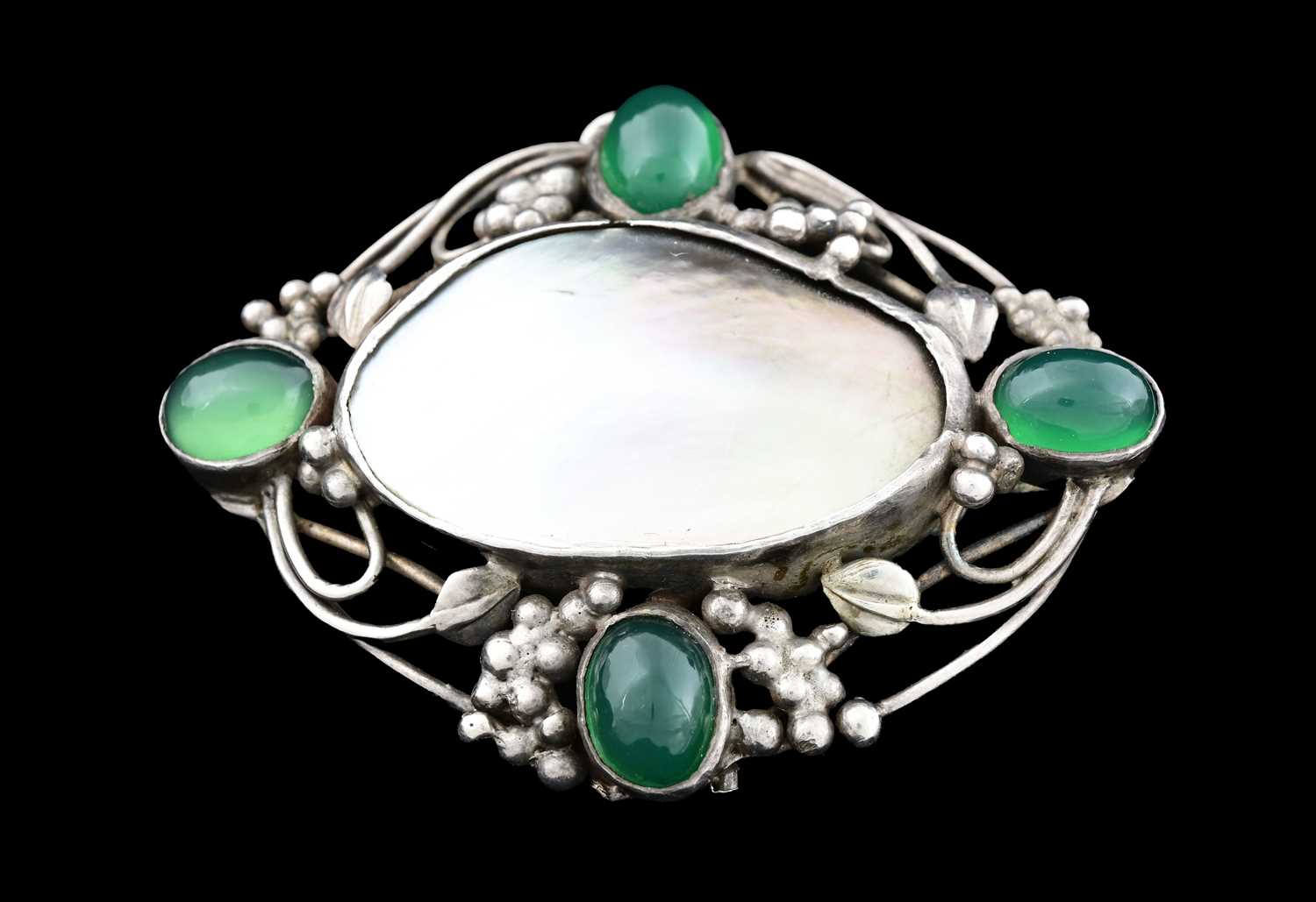 Lot 4 - An Arts and Crafts silver and gem set pendant...
