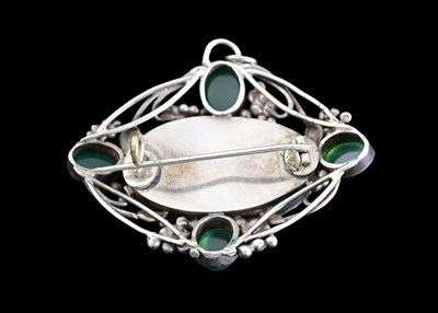 Lot 4 - An Arts and Crafts silver and gem set pendant...