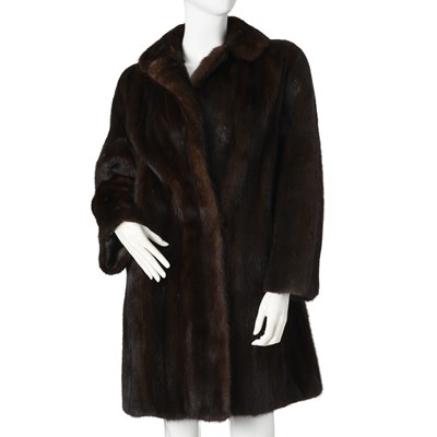 Lot 526 - A knee-length dark ranch mink coat.