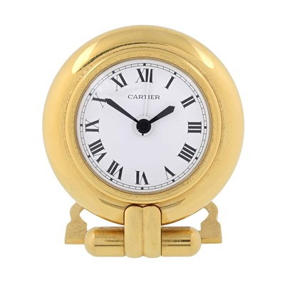 Lot 279 - Cartier, a gold plated Colisée travel alarm clock
