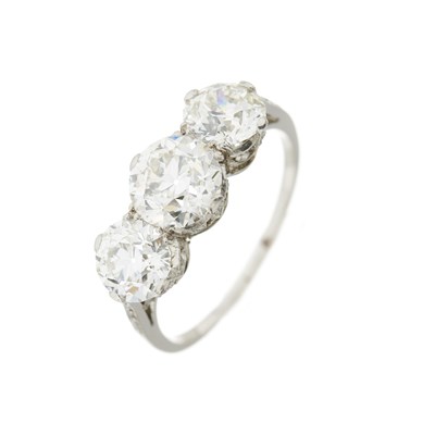 Lot 48 - A mid 20th century platinum old-cut diamond three-stone ring