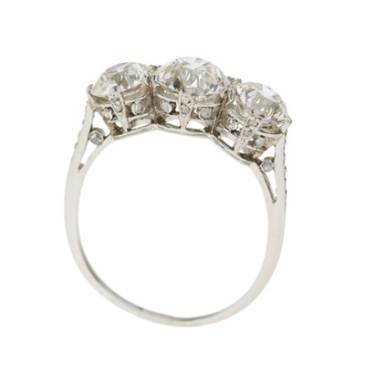 Lot 48 - A mid 20th century platinum old-cut diamond three-stone ring