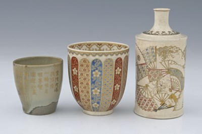 Lot 154 - A Japanese Satsuma pottery flask, decorated...