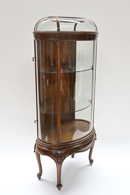 Lot 678 - A French figured walnut vitrine or display...