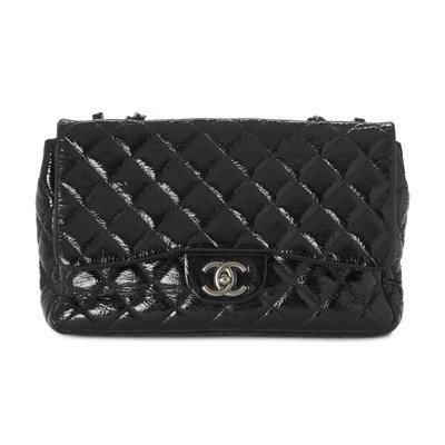Lot 309 - Chanel, a patent leather Jumbo Classic Flap handbag.