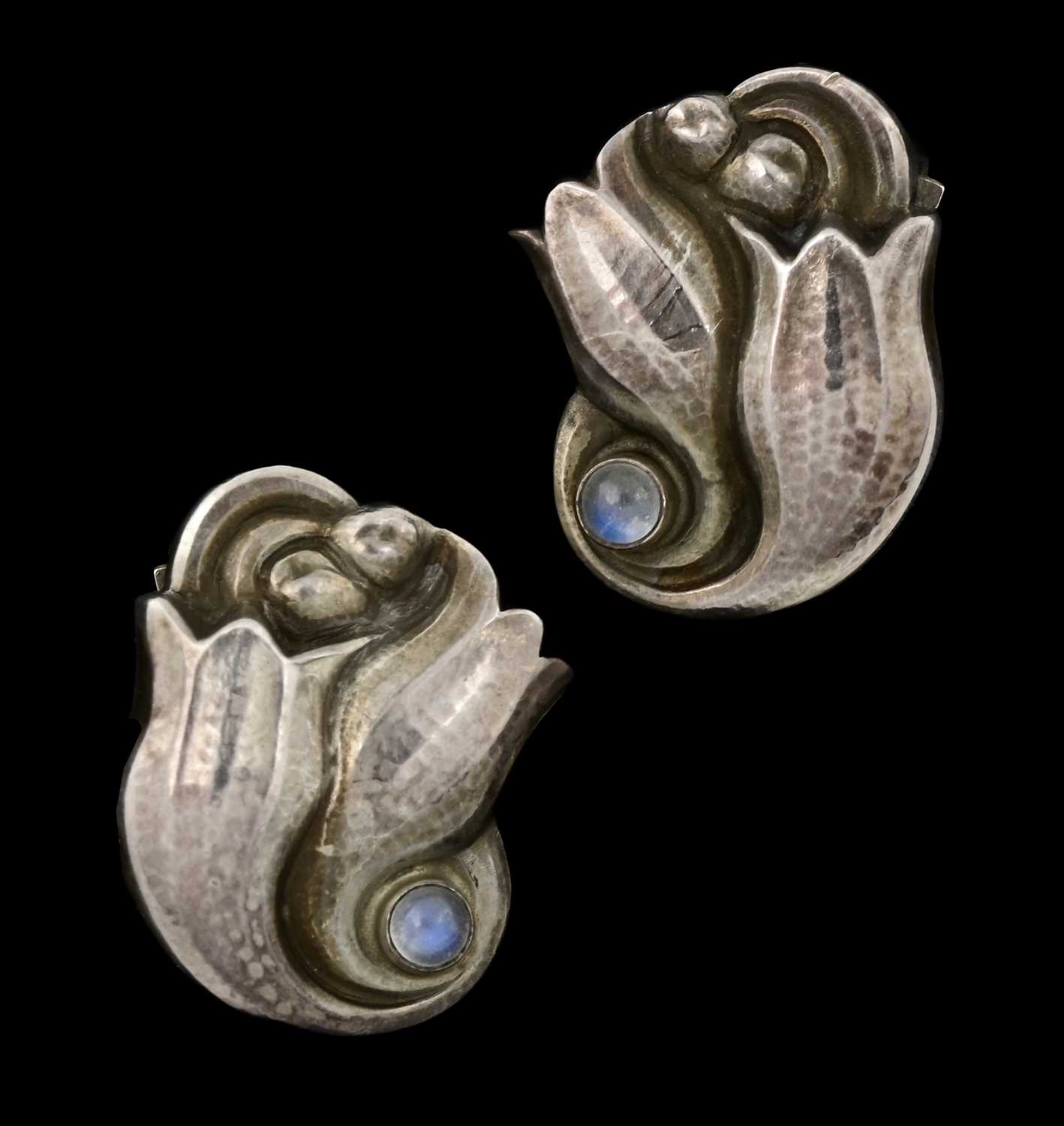 Lot 69 - Georg Jensen, a pair of mid 20th century moonstone flower clip-on earrings